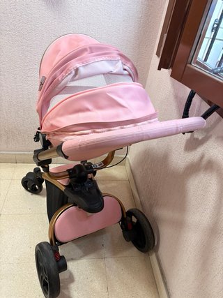 Coche de bebé rosa