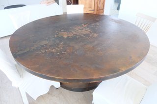 Mesa de comedor redonda de hierro estilo corten