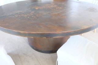 Mesa de comedor redonda de hierro estilo corten