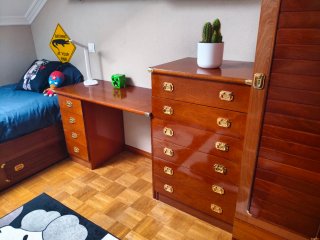 Habitación modular estilo camarote de barco.