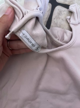 Camiseta rosa manga larga con cuello volante