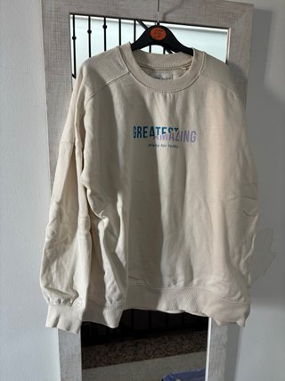 Sudadera crema Greatest Amazing