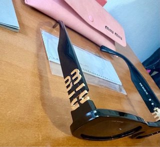 Gafas de sol Miu Miu negras