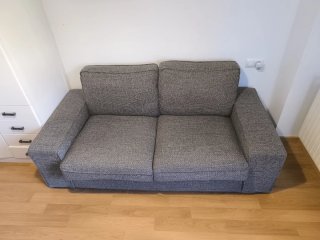 Sofá gris de tela