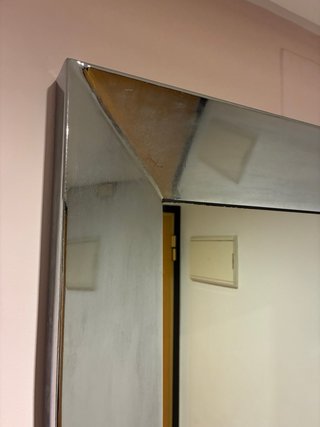 Espejo de pared plateado