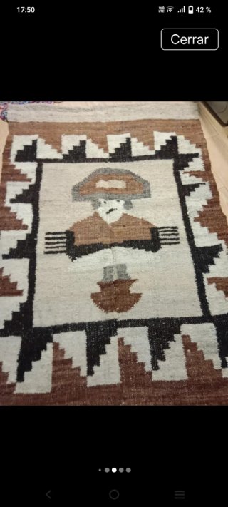 Alfombra de lana beige y marrón