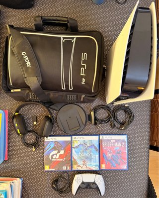 PS5 + Mando + 3 Juegos + Accesorios
