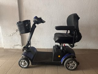 Scooter eléctrica 4 ruedas con cesta