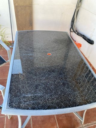 Mesa terraza cristal y 4 sillas metal