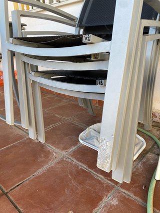 Mesa terraza cristal y 4 sillas metal