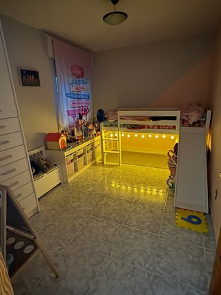 Cama infantil con tobogán