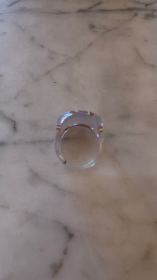 Anello trasparente con stella multicolore