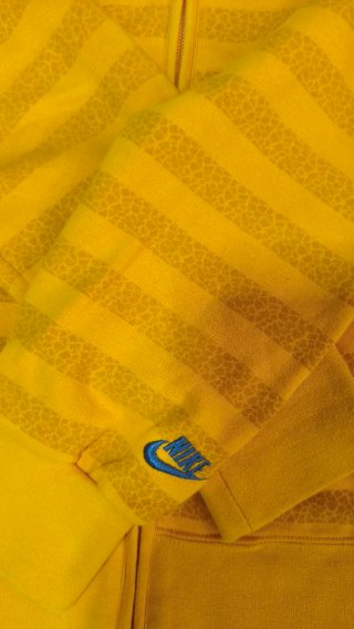 Sudadera Nike cremallera naranja y amarilla