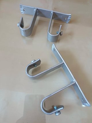 Soportes para cortinas de metal