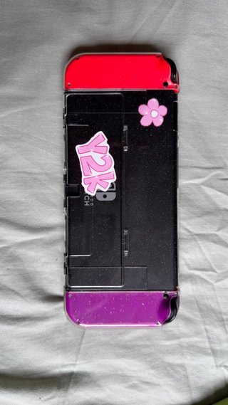 Nintendo Switch OLED Viola e Rosso