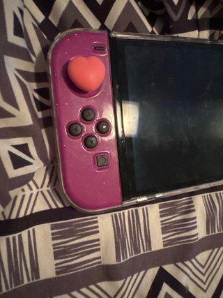 Nintendo Switch OLED Viola e Rosso