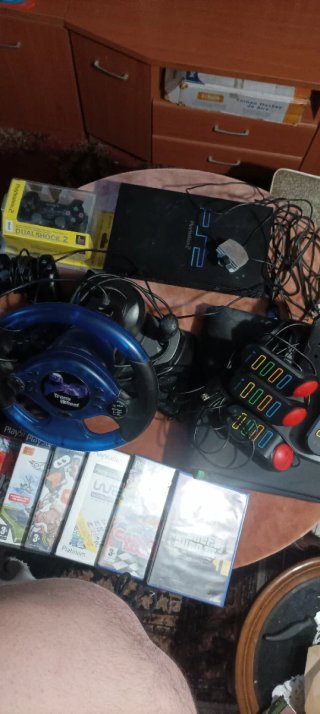 Lote PlayStation 2 con accesorios