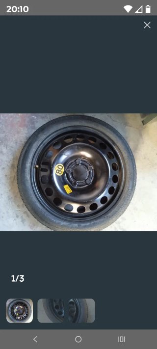 Rueda de repuesto Opel con accesorios