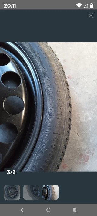 Rueda de repuesto Opel con accesorios
