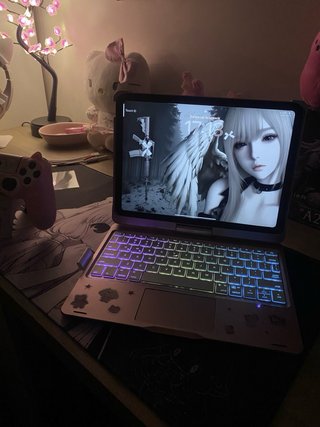 Funda con teclado iPad rotatorio