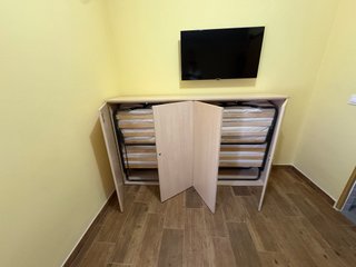 2 Camas supletorias con mueble