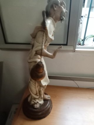 Figura antigua decorativa