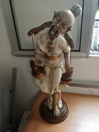 Figura antigua decorativa
