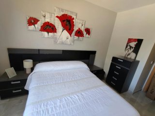 Dormitorio negro y gris