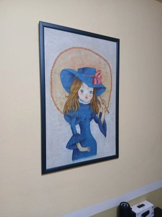 Cuadro niña con sombrero azul