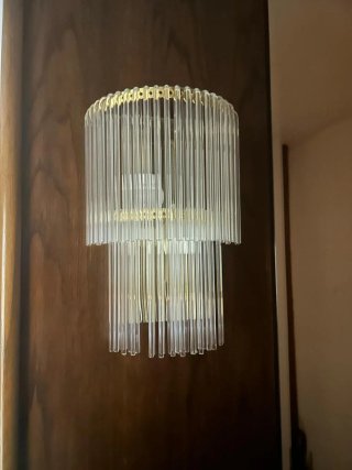 Lámpara de pared dorada y cristal