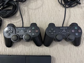 PlayStation 2 Slim Nera + Accessori