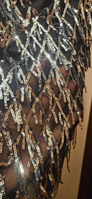 Top elegante con paillettes nero/argento taglia M