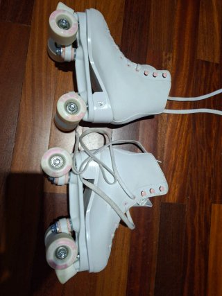 Pattini bianchi taglia 38