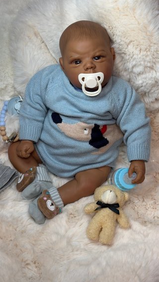 Muñeco bebé Reborn realista mulato