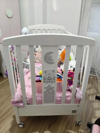 Minicuna blanca con cajonera y barrera movil