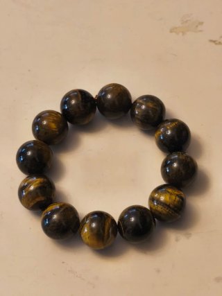 Tre braccialetti occhio di tigre grandi da 12mm