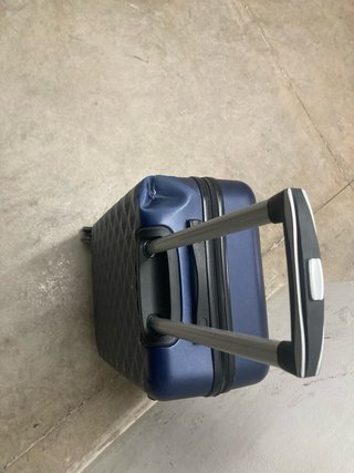 Maleta azul de viaje