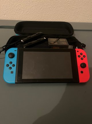 Nintendo Switch + 8 giochi e controller