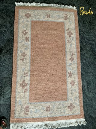Alfombra de pura lana con diseño floral