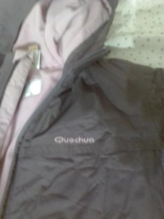 Cazadora Quechua con capucha rosa/lila