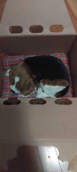 Peluche perro dormido