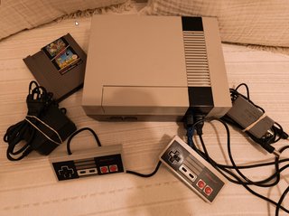 Nintendo NES + Mario Bros Duck Hunt + 2 controller