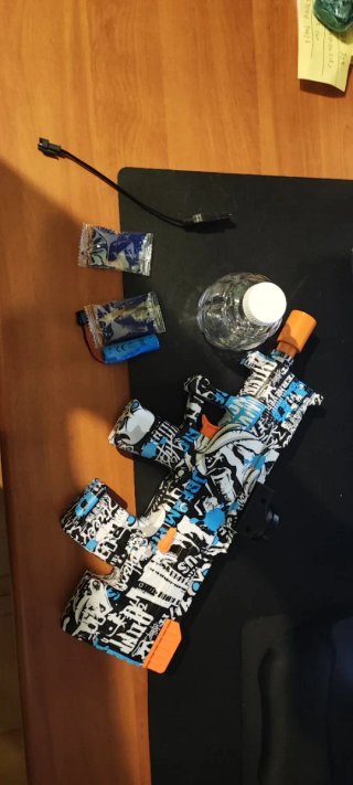 Pistola giocattolo con accessori