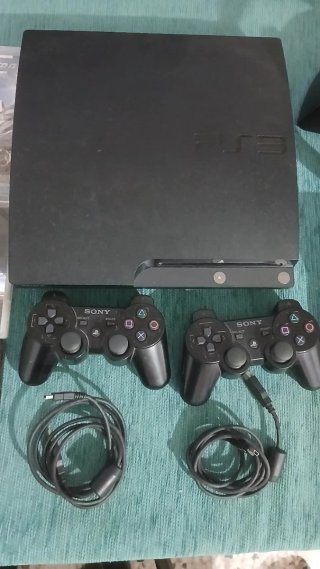 Consola PS3 + Volante y Juegos