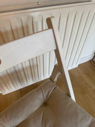 Silla plegable IKEA FRÖSVI blanca con cojín