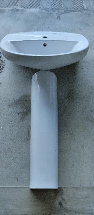 Pila de lavadero de porcelana blanca
