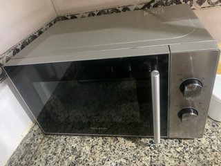 Microondas Taurus plateado Lo vendo por mudanza ya