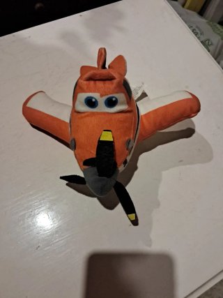 Peluche avión Cars naranja
