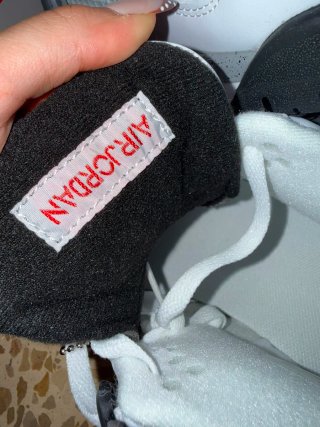 Jordan 4 White Cement