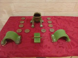 Juego de rana y monedas